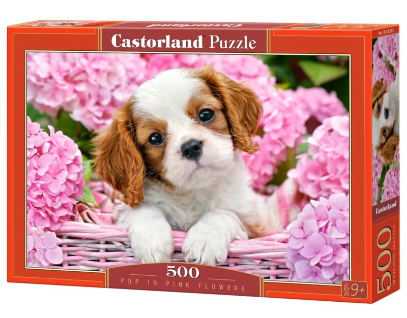 Welpe in rosa Blumen