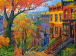 Herbstliche Stadt auf dem Hügel
